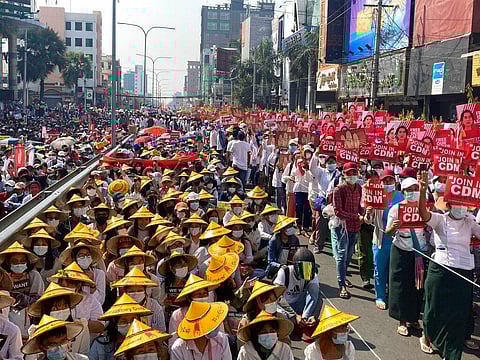 Anti-coup protesters fill the main road during a rally in Mandalay, Myanmar. (Photo | AP)