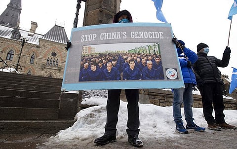 Protesters gather outside the Parliament buildings in Ottawa, Ontario. (Photo | AP)