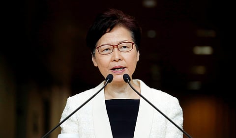 Hong Kong leader backs reforms to keep out 'hostile' people