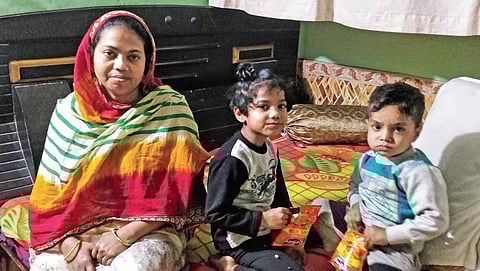 Firdaus with her six-year-old daughter Wania and three-year-old son Moosa.