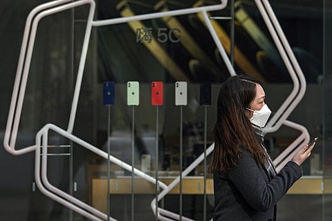 Woman at an Apple store. (Photo| AP)