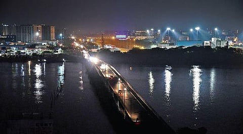 Vehicles on the poorly-lit Goshree bridge on Thursday night. Streetlights have not been functioning on the stretch for more than six months. A view from Kalamukku Junction in Vypeen | Albin Mathew