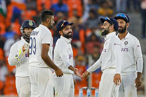 Indian bowler R Ashwin celebrates the dismissal of England's Jack Leach with his team. (Photo | PTI)