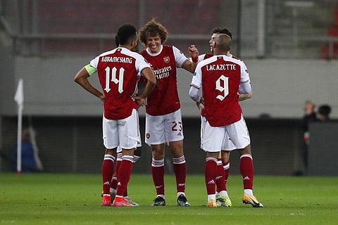 Arsenal's players celebrate after the end match against Benfica at Georgios Karaiskakis stadium, in Piraeus port, near Athens, Thursday, Feb. 25, 2021. (Photo | AP)