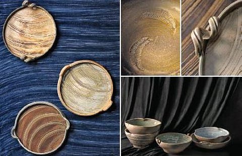 The collection of large bowls, platters and décor accents is brought to life with textured brushwork representing lines in the earth and interplay of floral and nature-inspired stamp motifs.