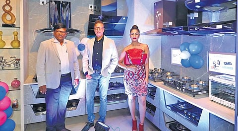 Director of Kutchina Namit Bajoria (centre) after inaugurating the new showroom at Bapuji Nagar in Bhubaneswar. (Photo | Irfana, EPS)