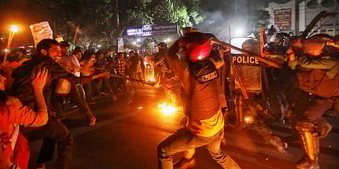 Demonstrators clash with police as they protest the death in prison of a writer who was arrested on charges of violating the sweeping digital security laws, in Dhaka. (Photo| AP)