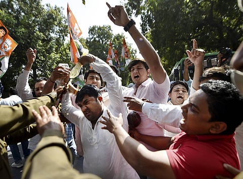 Indian youth Congress supporters take part in a demonstrative protest against the hike in fuel price. (Photo| PTI)