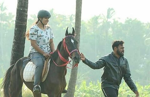 Sruti Chandran with her horse Kalyani which died a couple of days ago.
