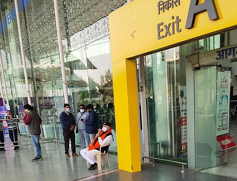 PM Modi's brother Prahlad Modi sits on dharna at Lucknow airport. (Photo | Express)
