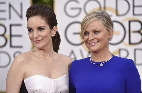 Tina Fey L), Amy Poehler (R) to host Golden Globes 2021. (File Photo | AP)