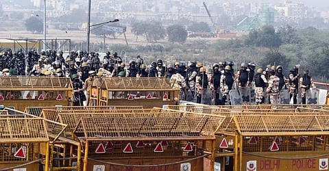 Security personnel keep vigil at Ghazipur border during the ongoing farmers agitation against Centres farm reform laws in New Delhi. (Photo | Parveen Negi/EPS)