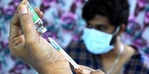 Health workers adminsitering Covishield vaccine to the frontline warriors as part of the second phase of vaccination drive in Tirupati. Express (Photo | Madhav K, EPS)