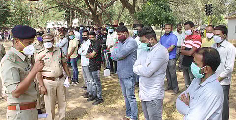 PKM Shantaraju seen cautioning the rowdies at DAR grounds in Shivamogga on Thursday.(Photo| EPS/ Shimoga Nandan)