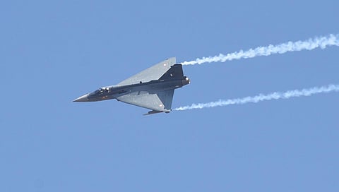 IAF aircraft Tejas flies past Yelahanka air base during  Aero India in Bengaluru. (Photo | Vinod Kumar T, EPS)
