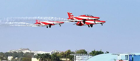 Team Surya Kiran prepare to land after performing on Day 2 of the Aero India 2021 at Air Force Station Yelahanka on Thursday/Pics: Vinod Kumar T