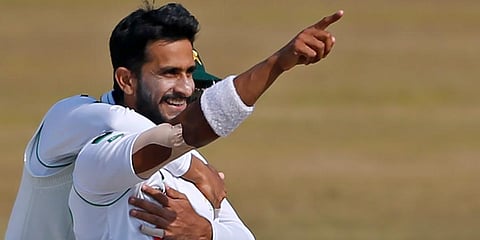 Pakistan's Hasan Ali celebrates after taking the wicket of South Africa's Anrich Nortje during the third day of the second cricket Test match at the Pindi Stadium in Rawalpindi. (Photo | AP)