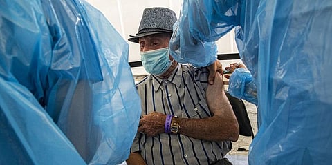 A Man receives a dose of China's Sinovac Biotech COVID-19 vaccine in Chile. (File Photo | AP)