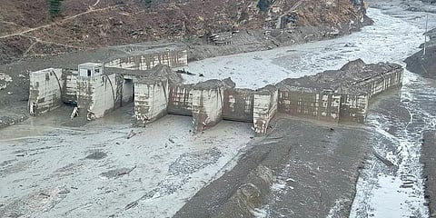 Damaged Dhauliganga hydropower project after a glacier broke off in Joshimath causing a massive flood in the Dhauli Ganga river in Chamoli of Uttarakhand. (Photo | PTI)