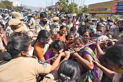Police had a hectic time dispersing a mob of protesting trade union and Left party activists at a ‘rasta roko’ at Maddilapalem Junction on Saturday I Express