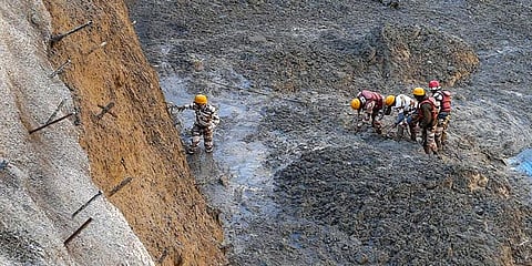 ITBP personnel dig to open Tapovan Tunnel which is completely blocked after a glacier broke off in Joshimath in Uttarakhand's Chamoli causing a massive flood in the Dhauli Ganga river. (Photo | PTI)