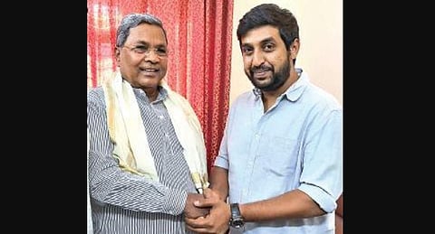 Raksha Ramaiah greeting former chief minister Siddaramaiah. (Photo | Express)