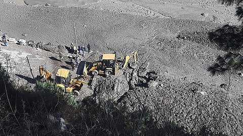 Rescue work is going on near Rishi Ganga Hydroelectric power project at Raini village, Joshimath, in Uttrakhand on Monday (Photo | EPS/Shekhar Yadav)
