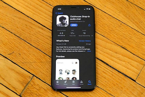 Apple's App Store page for the social media app Clubhouse is displayed on a smartphone screen in Beijing. (Photo | AP)