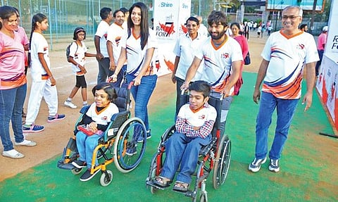 Prasanna Shirol (extreme right) with participants at a previous edition of the race