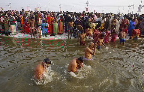 Hindu devotees take spiritual-cleansing dips in the Sangam, the confluence of the Ganges, Yamuna, and the mythical Saraswati rivers during the Kumbh Festival. (Photo: AP)