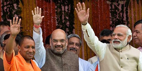 (From Left) Uttar Pradesh CM Yogi Adityanath, BJP president Amit Shah and PM Narendra Modi (Photo | AP)