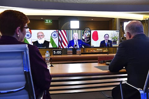 PM Scott Morrison(R), Foreign Minister Marise Payne (L) participate in the Quad summit with President Joe Biden, PM Yoshihide Suga and PM Narendra Modi in a virtual meeting. (Photo | AP)