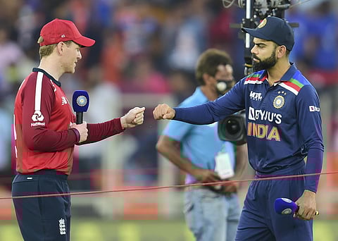 Virat Kohli with his England counterpart Eoin Morgan. (Photo | PTI)