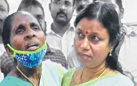 Bindu Krishna (right) with a protester at the Kollam DCC office | Express