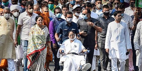 West Bengal Chief Minister Mamata Banerjee along with TMC leader Abhishek Banerjee (R) and others during a rally on 'Nandigram Diwas', in Kolkata. (Photo | PTI)