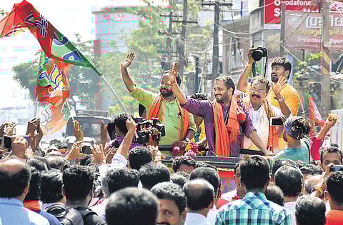 BJP state general secretary K Surendran waving BJP has announced candidates in the 115 seats the party is contesting in Kerala with state president K Surendran contesting in two constituencies. Here are 10 contenders who are among the party's best bets to increase their tally in the assembly. (Photo | BP Deepu, EPS)