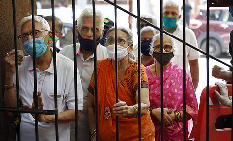 Senior citizens wait for their turn to get vaccinated with COVID-19 vaccine at BMC hospital in Mumbai. (File Photo | PTI)