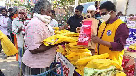 Clothes being distributed to the poor in Rajamahendravaram | Express