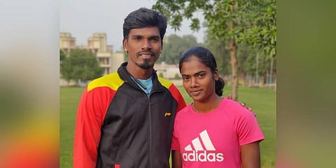 Dhanalakshmi with coach Manikanda Arumugam