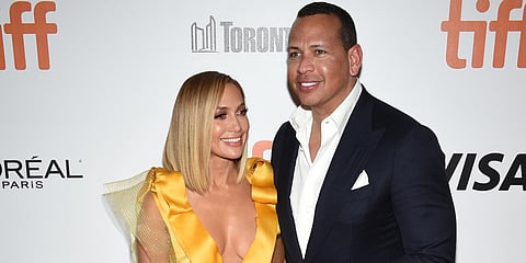 Jennifer Lopez (L) and Alex Rodriguez attend the premiere for 'Hustlers' on day three of the Toronto International Film Festival. (File photo| AP)