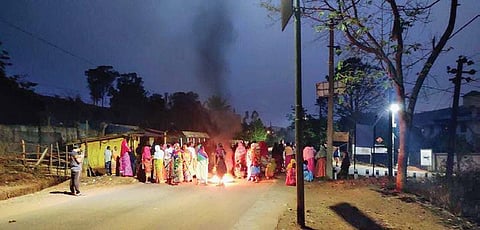 Protestors blocking the road to Damanjodi