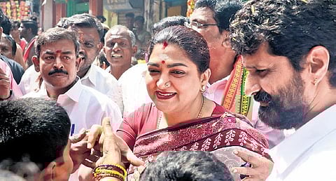 A file photo of actor-turned politician Kushboo and BJP National General Secretary C T Ravi campaigning for the party in Chennai