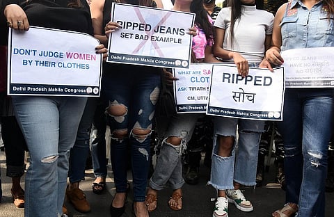 Delhi Pradesh Mahila Congress members take part in a protest against Uttarakhand CM remarks over ripped jeans. (Photo | Parveen negi, EPS)
