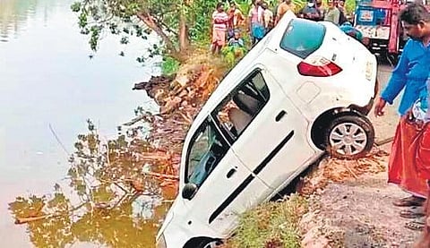 The car that fell into the Vamanapuram river near Pulimoottu Kadav on Friday morning. Both the occupants of the vehicle died in the mishap | Express