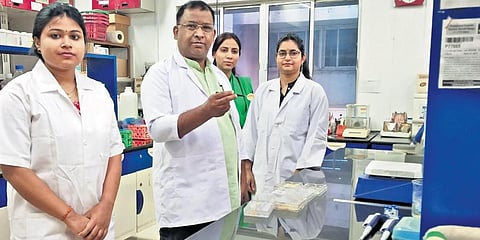 Dr Sanjeeb Sahoo (C) with his team members at the Institute of Life Sciences in Bhubaneswar. (Photo | EPS)