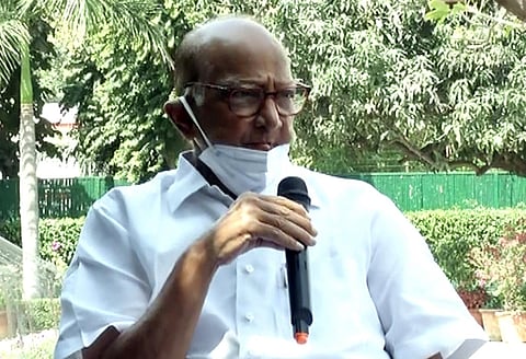 NCP Chief Sharad Pawar addresses media during a press conference, in New Delhi on Sunday. (Photo | ANI)