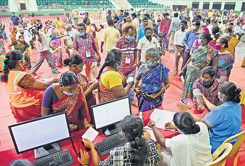 People getting vaccination at a special camp at Nehru Indoor stadium, in Chennai on Saturday | R Satishatish Babu abu