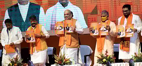 Union Home Minister Amit Shah releases BJP Manifesto of West Bengal election. (Photo| ANI)