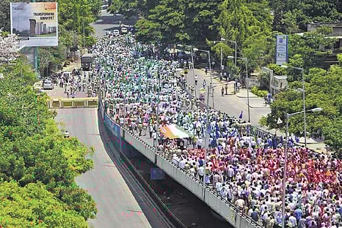 Members of farmer organisations march during a rally protesting against anti-farm laws, in Bengaluru on Monday | Ashishkrishna HP