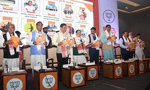 Assam CM Sarbananda Sonowal and other BJP leaders releasing the poll manifesto (Photo | Twitter/himantabiswa)